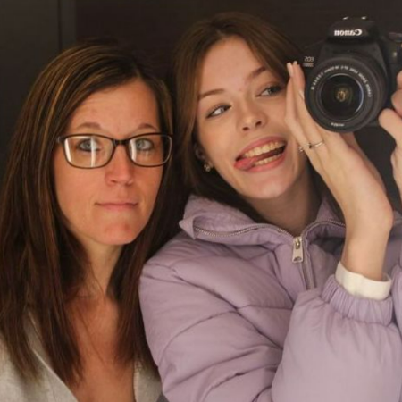 Cora Tilley clicking a picture with her mother.